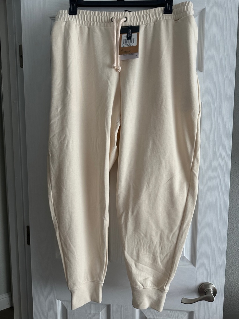 The North Face Cream Track Joggers